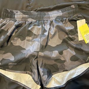 Brad new women’s running shorts. NWT! Size medium.
